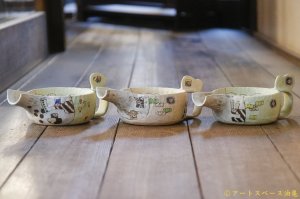 画像: 高山愛 注ごう